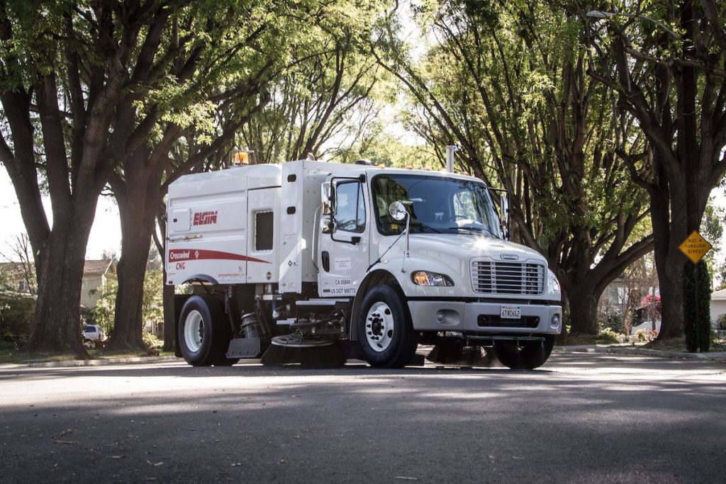 Used Crosswind street sweeper on road outside of Haaker Equipment Company in Los Angeles CA