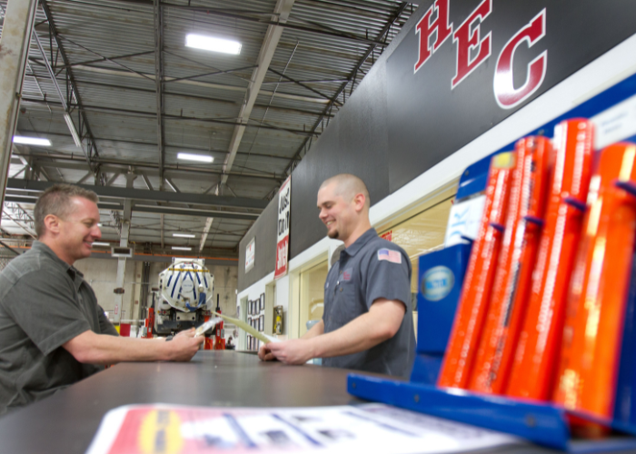 An employee of Haaker Equipment Company discusses preventative maintenance with a customer in Las Vegas